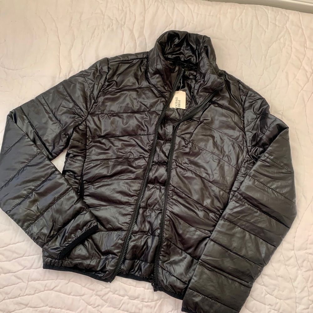 Brand new PACKABLE down jacket. Women’s size small